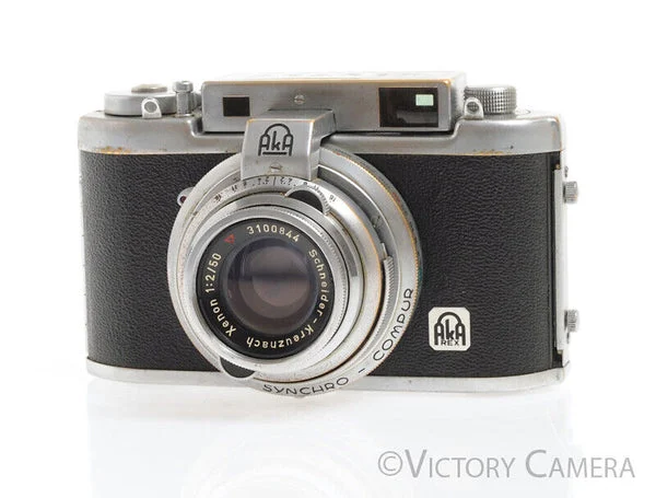 Akarex III Chrome 35mm Rangefinder w/ 50mm f2 Schneider Xenon Lens -Light Haze- [EXC-]