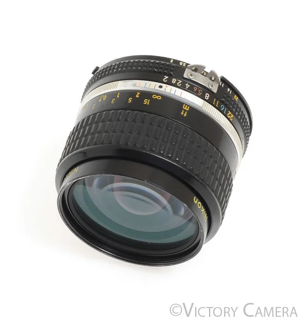 Nikon Nikkor 35mm f2.0 AI-S Fast Wide Angle Lens -Yellow Text, T.S.A- [EXC]