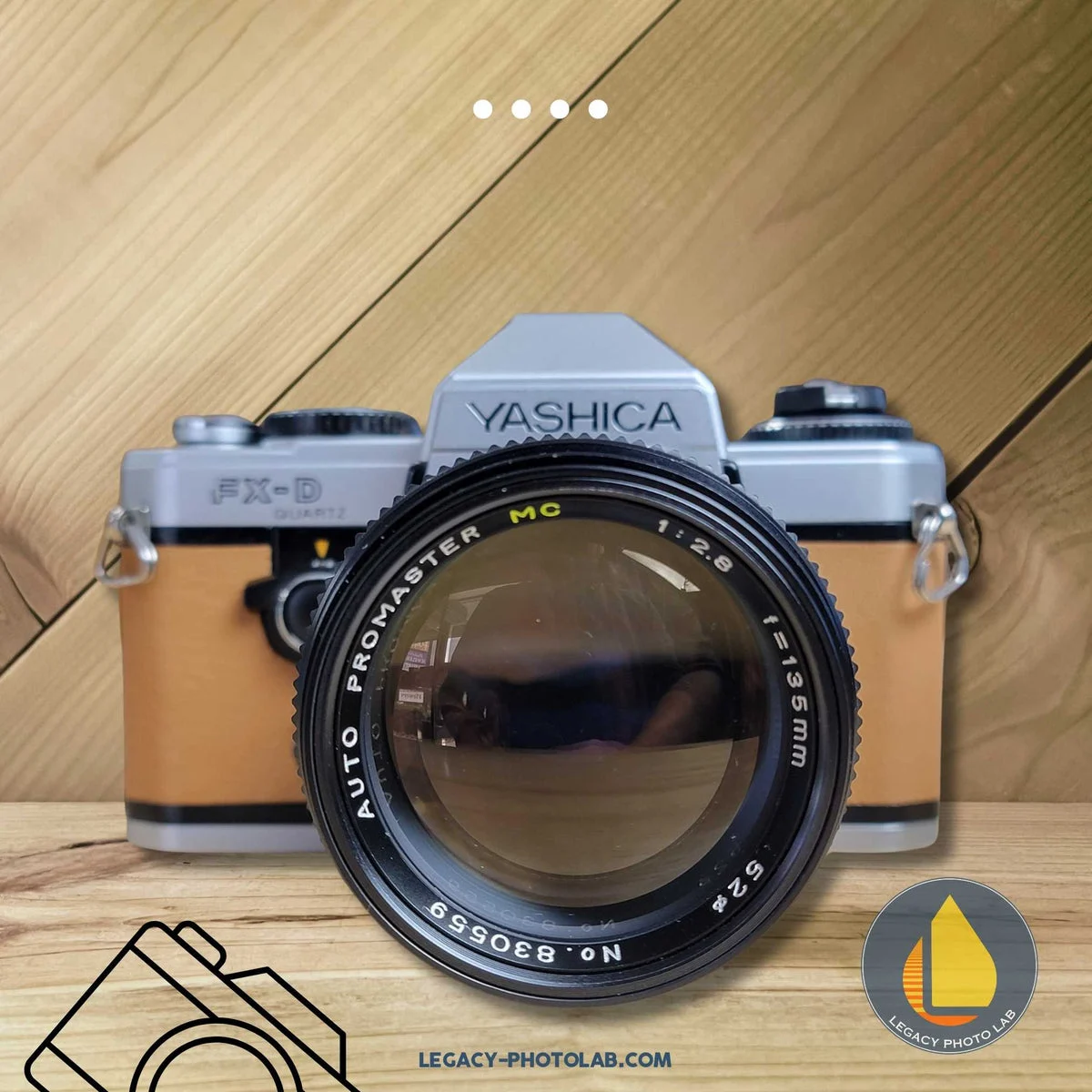 Yashica FXD 35mm SLR with 135mm f/2.8 lens